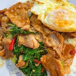Pork stir-fry with basil and rice