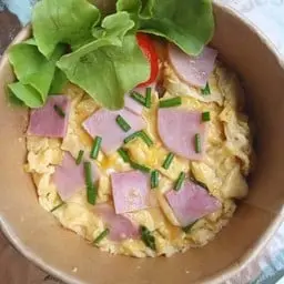 Rice with creamy scrambled eggs and ham