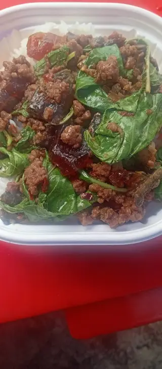 Stir-fried minced pork with basil and century egg