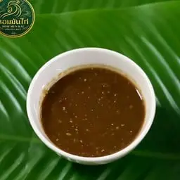 Rich soybean dipping sauce, a recipe from Hom Man Kai restaurant.