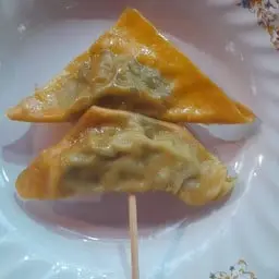5 skewers of fried pork dumplings