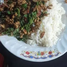 Stir-fried minced pork with basil, served over rice.