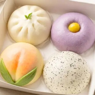 Vegetarian set: Stir-fried mixed vegetables, taro paste, black sesame, and longevity peach.