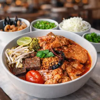 1 set of Khanom Jeen Nam Ngiao (Thai rice noodles with spicy pork broth)