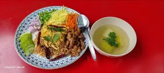 Rice mixed with shrimp paste, served with soup.