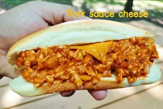 Pork sauce cheese hot dog