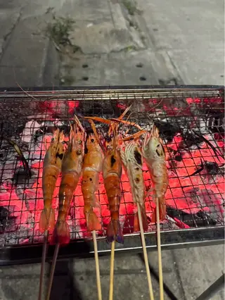 3 skewers of grilled shrimp