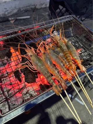 12 skewers of grilled shrimp