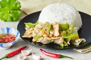 Rice topped with stir-fried mild chili peppers.