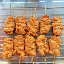 Fried pork on a stick
