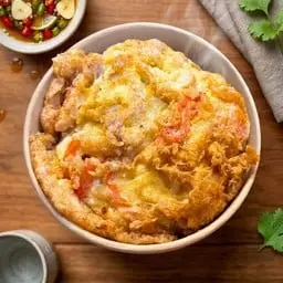 Rice with two eggs, minced pork, and sausage.
