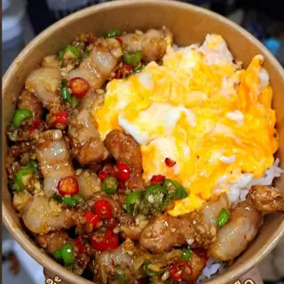 Rice with creamy scrambled eggs and stir-fried pork belly with chili and salt.