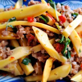 Rice with basil and yellow bamboo shoots